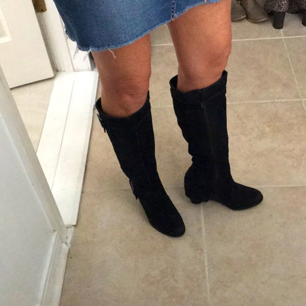 Cute tall wedge suede boots.  Heel is about 3 inches.